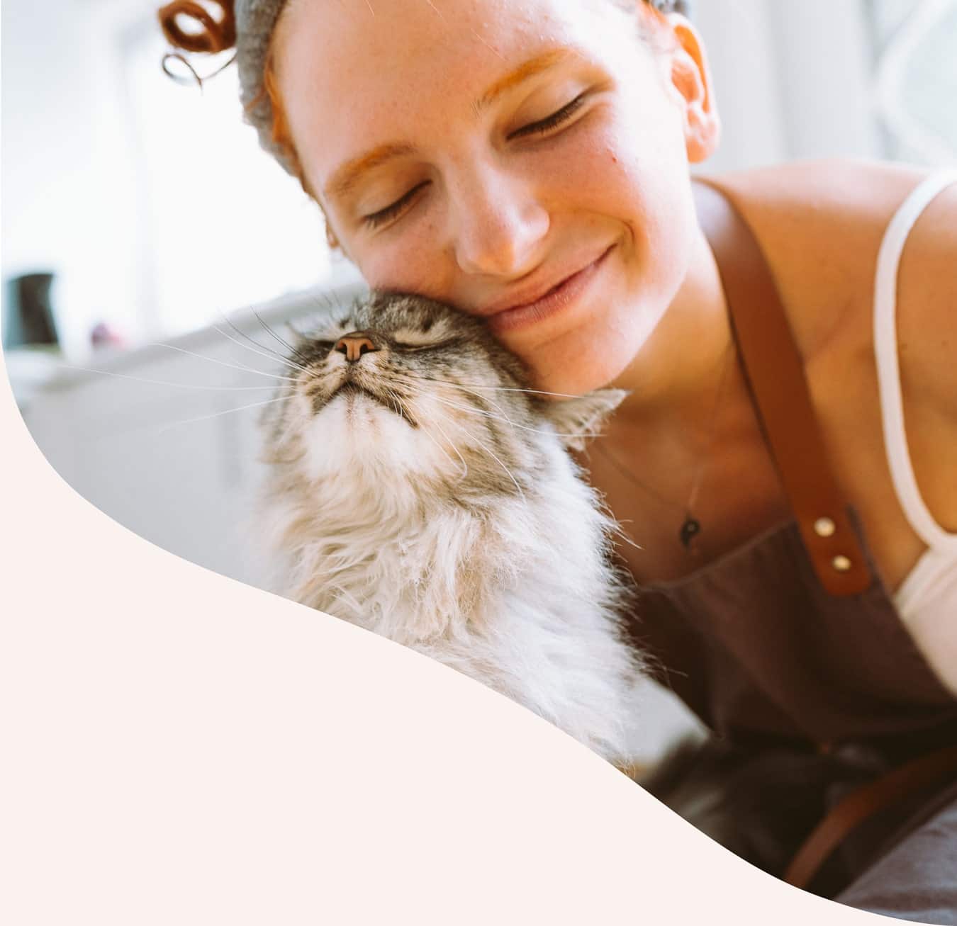 Cat and owner cuddle, happy and healthy on their way to a vet appointment in Phoenix AZ